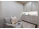 Cozy sitting room with custom cabinets and a comfortable chair at 4615 Northside Dr, Atlanta, GA 30327