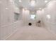 Spacious walk-in closet with custom shelving, drawers, and cabinets for optimal storage and organization at 4615 Northside Dr, Atlanta, GA 30327