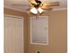 Neutral bedroom with a ceiling fan and a closet at 1655 Old Salem Rd, Covington, GA 30013