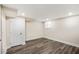 Basement room featuring wood-look flooring, recessed lighting, and a window at 1890 Carla Dr, Morrow, GA 30260