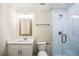 Bathroom featuring walk-in shower, and a white vanity at 1890 Carla Dr, Morrow, GA 30260