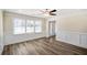 Bright dining room with wood floors and wainscoting at 1890 Carla Dr, Morrow, GA 30260