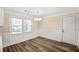 Dining area with wainscoting that opens to the modern kitchen at 1890 Carla Dr, Morrow, GA 30260