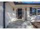 Close-up of the home's front door with sidelights and exterior lighting at 1890 Carla Dr, Morrow, GA 30260