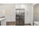 Kitchen area with stainless steel refrigerator and lots of storage at 1890 Carla Dr, Morrow, GA 30260