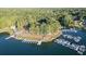 Aerial view of a marina on a lake with boat docks and a boat ramp at 2333 Sheridan Ct, Villa Rica, GA 30180