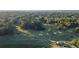 Aerial view of community golf course surrounded by trees at 2333 Sheridan Ct, Villa Rica, GA 30180