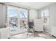 Bright bedroom with a window view, grey scale decor and light-colored walls and carpet at 2333 Sheridan Ct, Villa Rica, GA 30180