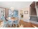 Charming dining room with hardwood floors, decorative chandelier, and blue china cabinet at 2333 Sheridan Ct, Villa Rica, GA 30180