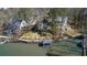 A waterfront home featuring a private dock and covered boat slip at 2333 Sheridan Ct, Villa Rica, GA 30180