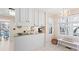 Bright and airy kitchen nook featuring natural light and a cozy bench by the window at 2333 Sheridan Ct, Villa Rica, GA 30180