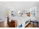 Light-filled main bedroom with hardwood floors, large windows, and stylish decor at 2333 Sheridan Ct, Villa Rica, GA 30180