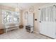 Bright mud room with tile flooring, storage bench, and coat rack, next to the door at 2333 Sheridan Ct, Villa Rica, GA 30180