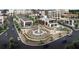 Breathtaking aerial view of the community with commercial buildings and outdoor social gathering areas at 3790 Chattahoochee (Lot 33) Rd, Cumming, GA 30041