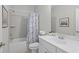 Bathroom featuring a tub, toilet, vanity with sink, mirror, decor, lighting, and tiled shower at 3790 Chattahoochee (Lot 33) Rd, Cumming, GA 30041
