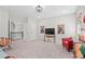 Large bonus room with comfortable seating, tv, and natural light at 3790 Chattahoochee (Lot 33) Rd, Cumming, GA 30041