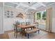 Dining room with coffered ceilings and a farmhouse-style table at 3790 Chattahoochee (Lot 33) Rd, Cumming, GA 30041