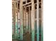 An unfinished entryway featuring wood frame walls and door framing at 3790 Chattahoochee (Lot 33) Rd, Cumming, GA 30041