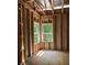 Image featuring the framework with dual windows allowing natural light to pour into the future room at 3790 Chattahoochee (Lot 33) Rd, Cumming, GA 30041
