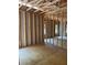 Framed interior of home under construction showing the layout, stud walls, and window openings at 3790 Chattahoochee (Lot 33) Rd, Cumming, GA 30041