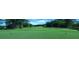 Scenic golf course view showing lush green fairways and manicured tee boxes, perfect for golf enthusiasts at 3790 Chattahoochee (Lot 33) Rd, Cumming, GA 30041