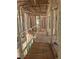 Framed hallway shows the floorplan and layout of this home under construction with natural light at 3790 Chattahoochee (Lot 33) Rd, Cumming, GA 30041