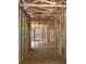 Framed hallway shows a home's layout, with door frames highlighting the construction process and potential at 3790 Chattahoochee (Lot 33) Rd, Cumming, GA 30041