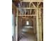 Interior framework of a home showcases the layout, with window and door frames in progress at 3790 Chattahoochee (Lot 33) Rd, Cumming, GA 30041