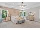 Spacious main bedroom featuring a tray ceiling, neutral palette, and plenty of natural light at 3790 Chattahoochee (Lot 33) Rd, Cumming, GA 30041