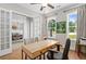 Office with hardwood floors, a large window, and french doors to dining room at 3790 Chattahoochee (Lot 33) Rd, Cumming, GA 30041