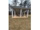 An outdoor pavilion with tables, seating and a ceiling fan at 3790 Chattahoochee (Lot 33) Rd, Cumming, GA 30041