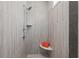 Bright shower with rain shower head, shower seat and shelving space for the utmost convenience at 3790 Chattahoochee (Lot 33) Rd, Cumming, GA 30041
