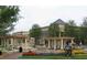 Community center featuring fountains, landscaping, and walking areas at 3790 Chattahoochee (Lot 33) Rd, Cumming, GA 30041