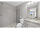 Bathroom featuring a tiled shower and granite vanity at 3790 Chattahoochee (Lot 33) Rd, Cumming, GA 30041