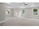 Large bedroom featuring neutral paint, recessed lighting, and two windows at 3790 Chattahoochee (Lot 33) Rd, Cumming, GA 30041