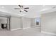 Large bedroom with tray ceiling, recessed lights, and carpet at 3790 Chattahoochee (Lot 33) Rd, Cumming, GA 30041