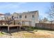 Rear view of house and multi-level deck with gazebo at 71 Riverside Ct, Douglasville, GA 30134