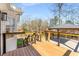 This backyard deck overlooks a natural wooded area at 71 Riverside Ct, Douglasville, GA 30134