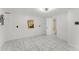 This basement has white brick and tile floors with a shower at 71 Riverside Ct, Douglasville, GA 30134