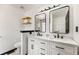 Updated bathroom featuring a double vanity, modern lighting, and stylish fixtures at 71 Riverside Ct, Douglasville, GA 30134