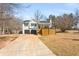 Charming home featuring a garage and modern deck in a residential neighborhood at 71 Riverside Ct, Douglasville, GA 30134