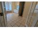 Bathroom with tiled flooring, walk-in shower, and a large cabinet with mirror at 1205 Peeksville Rd, Locust Grove, GA 30248