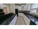 Kitchen featuring granite countertops, ample cabinets, and black refrigerator at 1205 Peeksville Rd, Locust Grove, GA 30248