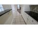 Beautiful kitchen with white cabinets and tile floors at 1205 Peeksville Rd, Locust Grove, GA 30248