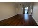 Open concept living room with wood floors and natural light at 1205 Peeksville Rd, Locust Grove, GA 30248