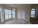 Bright living room featuring tile floors and views to the backyard at 1205 Peeksville Rd, Locust Grove, GA 30248