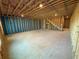 Unfinished basement with exposed beams, concrete floors, and blue insulation at 3904 Allegretto Cir # 50, Atlanta, GA 30339