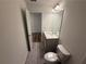 Bathroom with gray floors, a toilet, and a single vanity at 3904 Allegretto Cir # 50, Atlanta, GA 30339