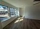 The hardwood floor room is brightened by natural light from the windows at 3904 Allegretto Cir # 50, Atlanta, GA 30339