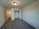 Neutral bedroom with gray carpet and double door closet at 3904 Allegretto Cir # 50, Atlanta, GA 30339